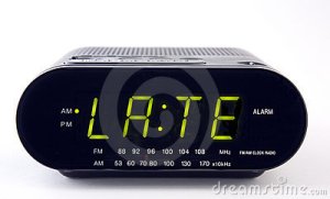 radio-di-orologio-con-la-parola-ritardo-17963880